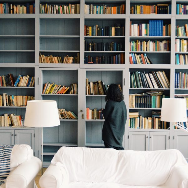 Photo of Girl Browsing Books